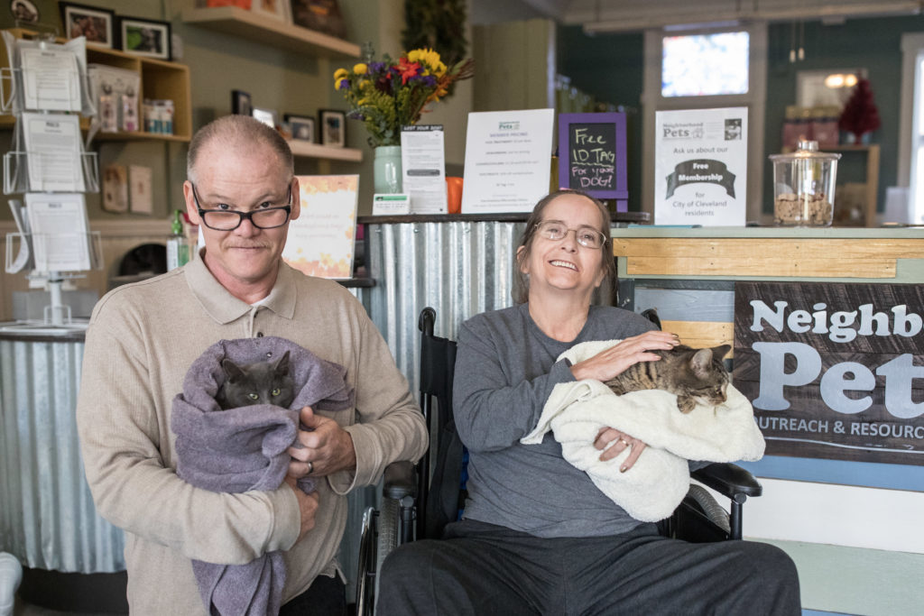 Slavic Village residents Mike and Bonnie proudly holding their kittens at the Neighborhood Pets Outreach & Resource Center. (Photo courtesy of Greg Murray)